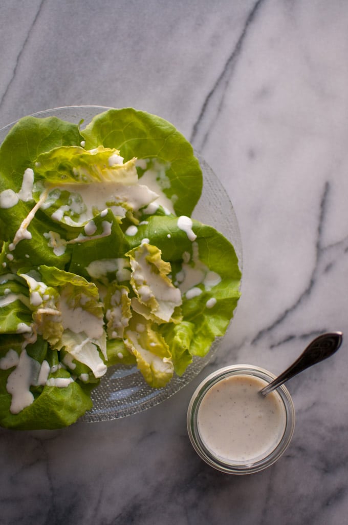 close-up of butter leaf salad with creamy lemon salad dressing
