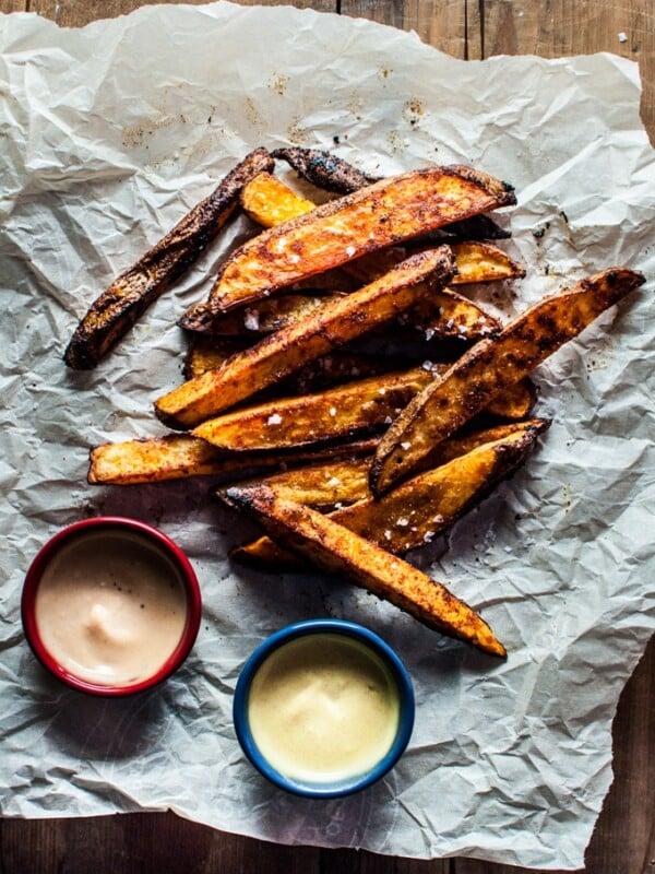 Enjoy these beer oven fries as a healthier alternative to deep frying. The beer soak prepares the potatoes so they're crispy on the outside and soft and fluffy on the inside.