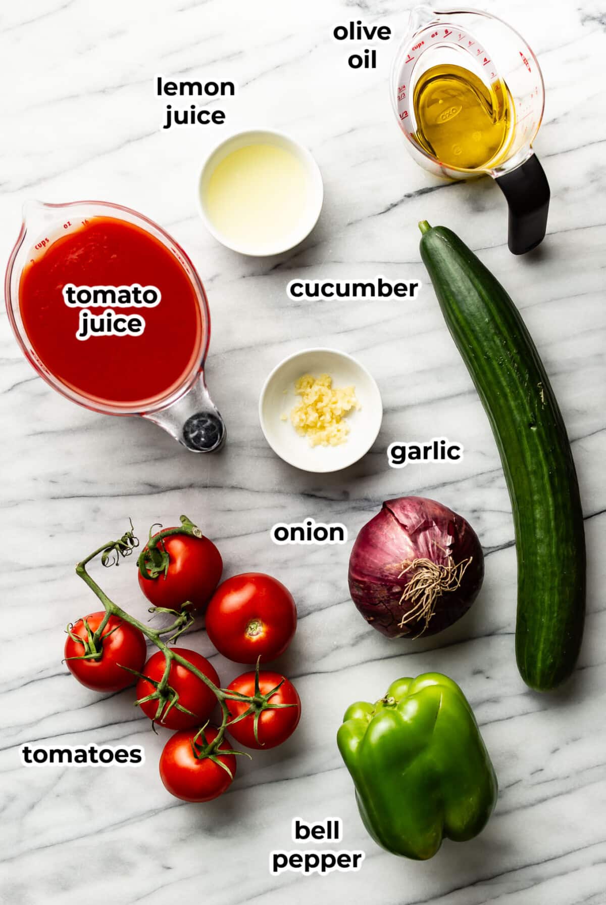 ingredients for gazpacho in prep bowls