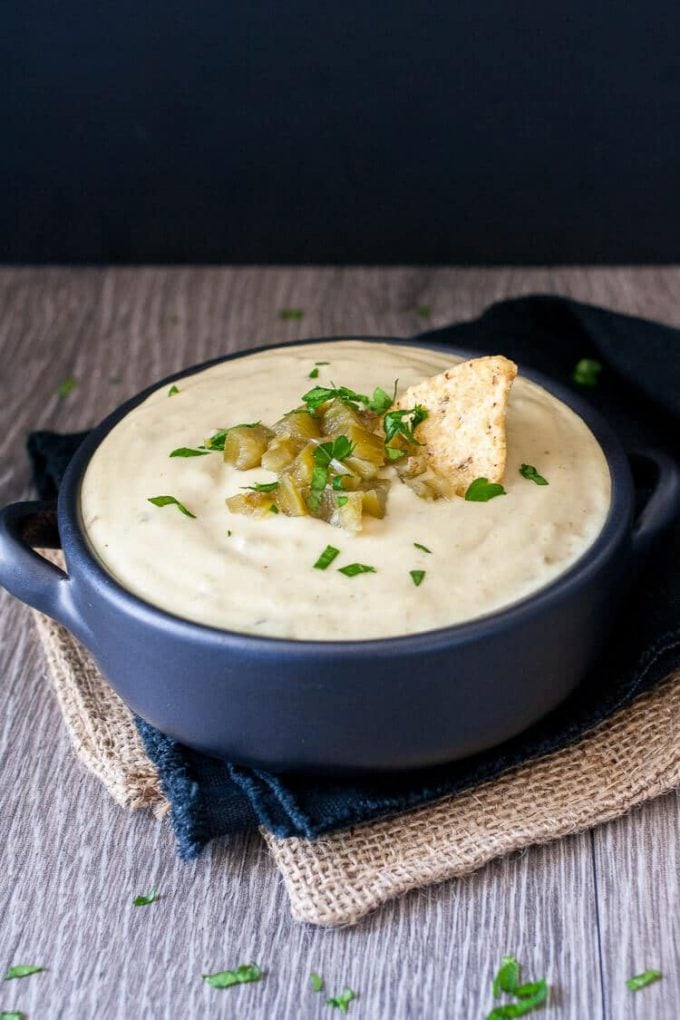 Mexican white cheese queso dip in a small ramekin