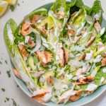 This healthier grilled salmon Caesar salad is lightened up so you can have that fabulous Caesar taste without all the extra calories.