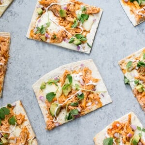 This skinny buffalo chicken flatbread pizza is a lighter way to enjoy the flavor of buffalo chicken wings. If you like it spicy, you'll love this healthy flatbread recipe!