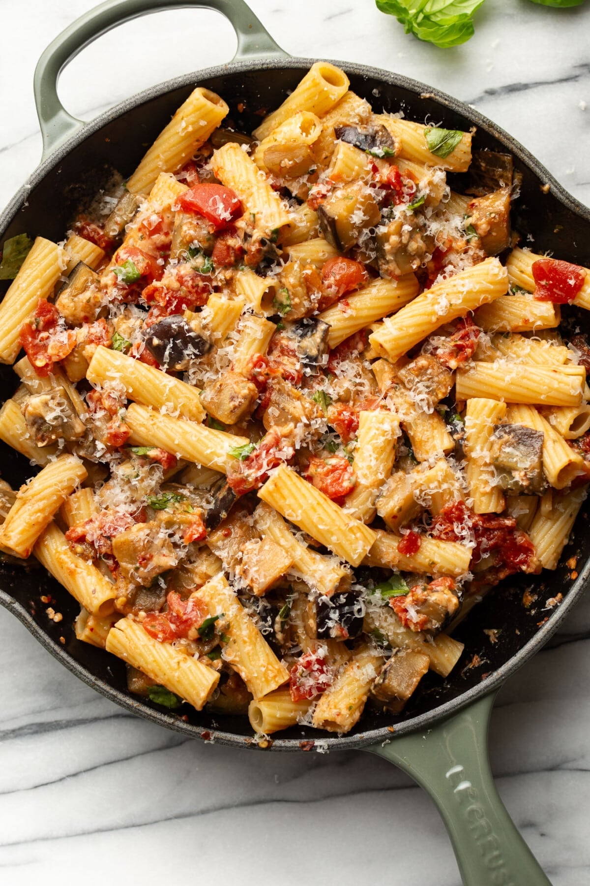 a skillet with pasta alla norma
