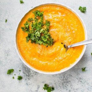 This vibrant vegetarian carrot and celery root soup is chock full of nutrients, has a wonderful sweet-savory flavor, and is easy to make.