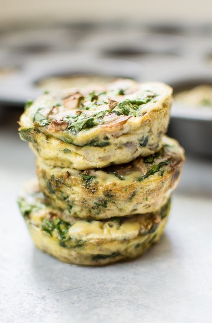 a stack of three spinach and mushroom egg muffins