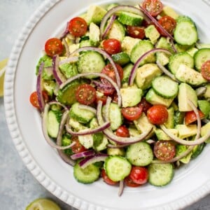 This easy cucumber tomato avocado salad is healthy, fresh, and bursting with flavor. It comes together fast and uses everyday ingredients.
