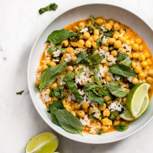 This quick and easy vegan chickpea coconut curry is ready in less than 15 minutes! It's fresh, healthy, and delicious. Great served over rice!