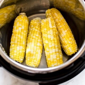 It's fast and easy to cook corn on the cob in your Instant Pot! You will love this method for cooking perfect corn every time. This healthy summer side dish recipe is perfect for BBQs or potlucks.