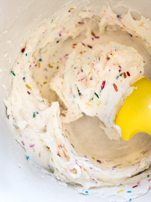 This homemade funfetti frosting recipe is perfect for icing cookies, cupcakes, or other sweet treats. It's wonderful for kids' birthday parties!