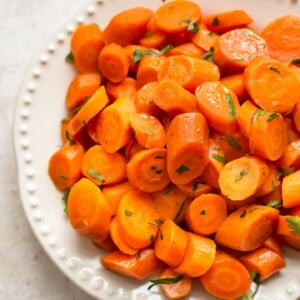 These slow cooker honey glazed carrots make the best easy side dish! Minimal prep and little effort yield delicious results.