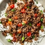 a bowl of asian inspired ground beef over rice