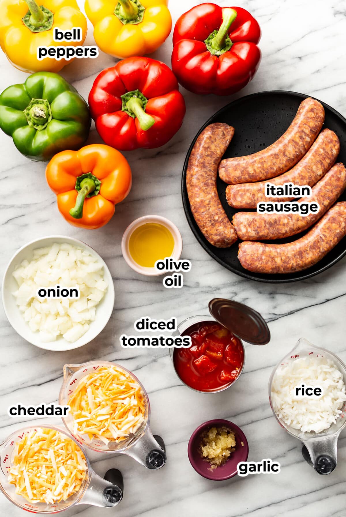 ingredients for italian sausage stuffed peppers in prep bowls