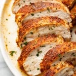 a plate with sliced air fryer chicken breast