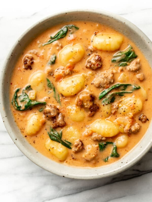 a bowl of creamy italian sausage gnocchi soup