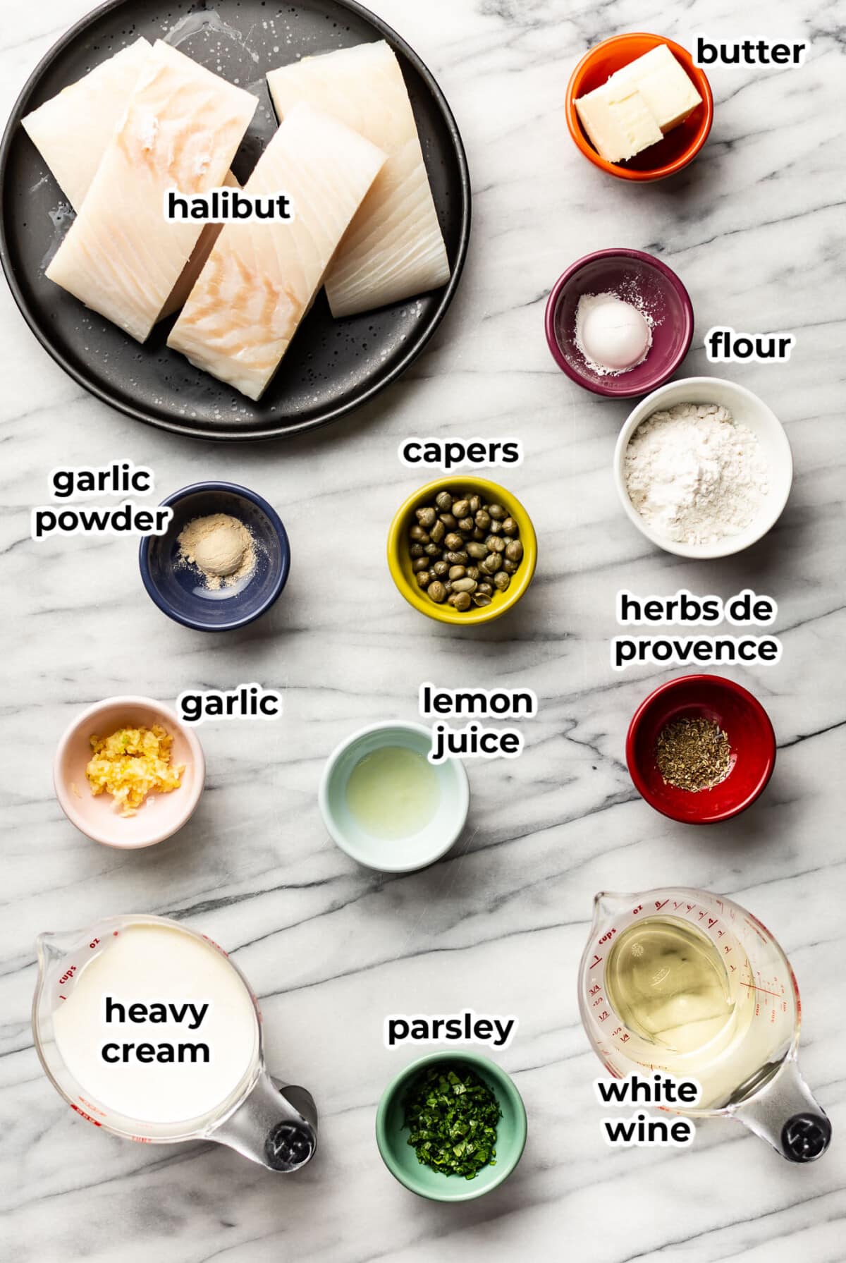 ingredients for creamy white wine halibut in prep bowls