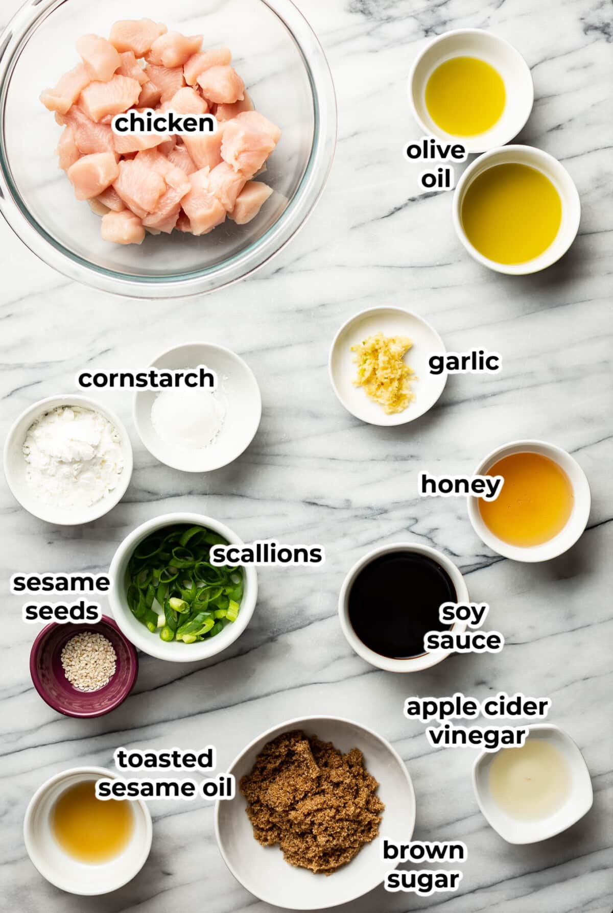 ingredients for sesame chicken in prep bowls