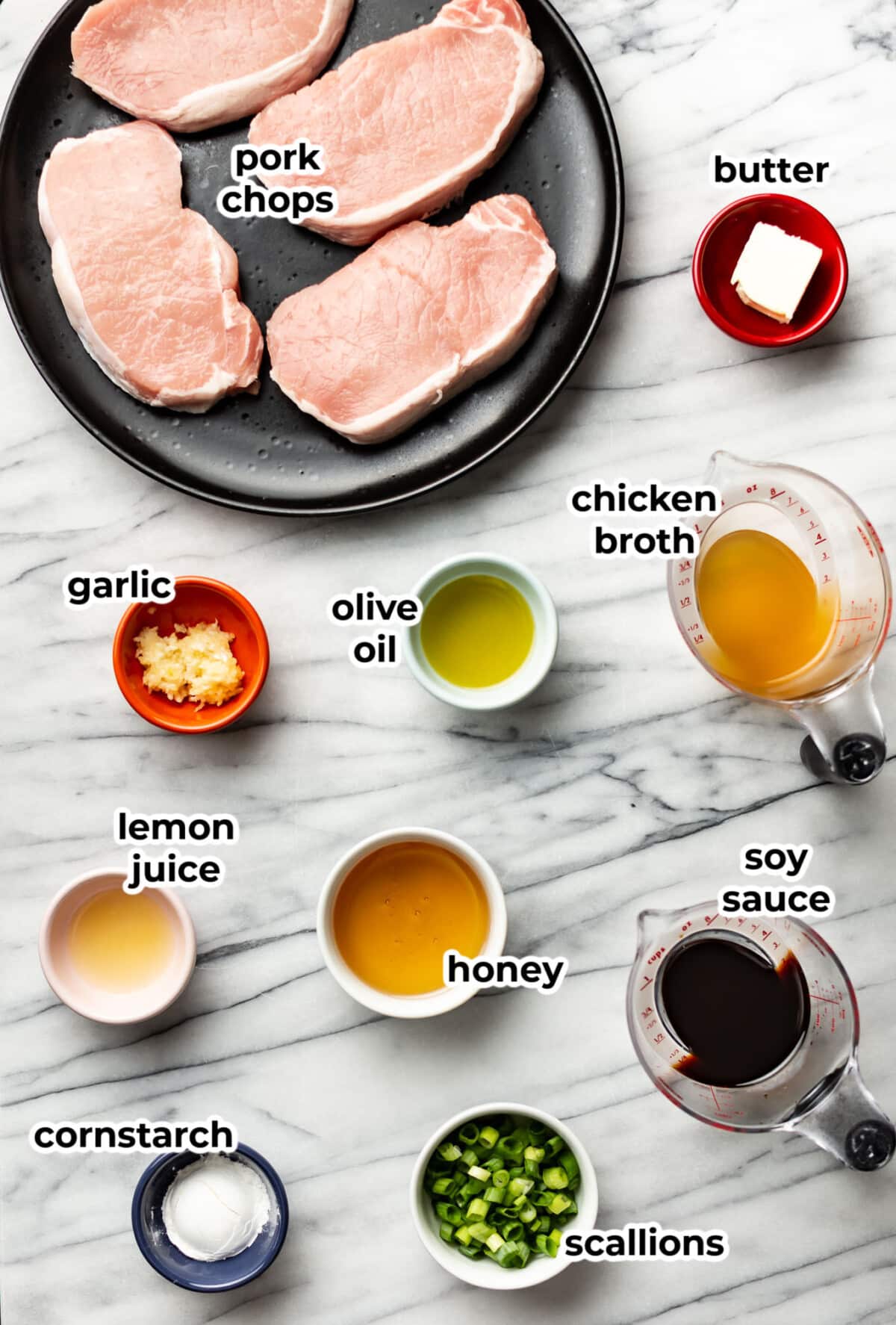 ingredients for honey garlic pork chops in prep bowls