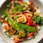 a bowl of vegetable stir fry with rice