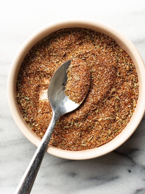 a bowl with homemade blackened seasoning and a spoon