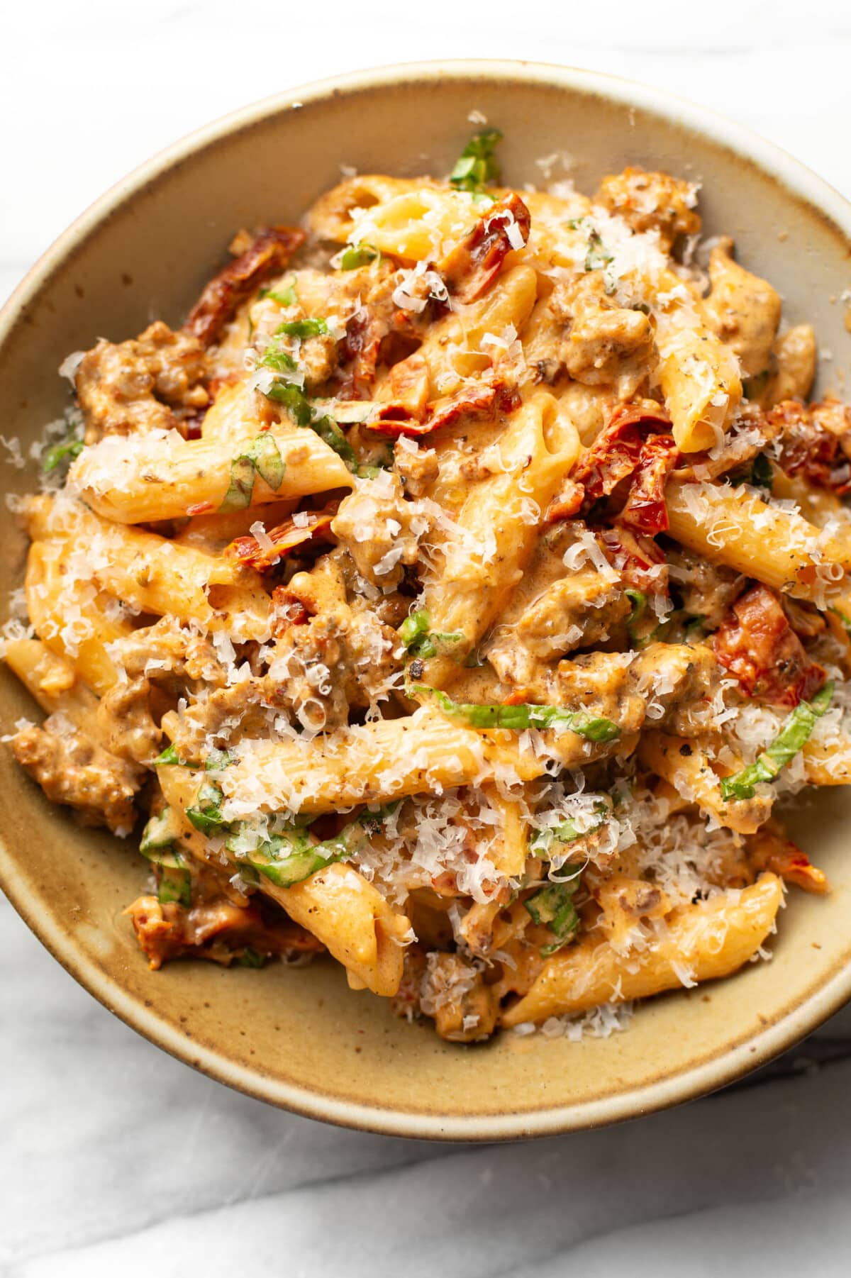 a bowl of marry me italian sausage pasta