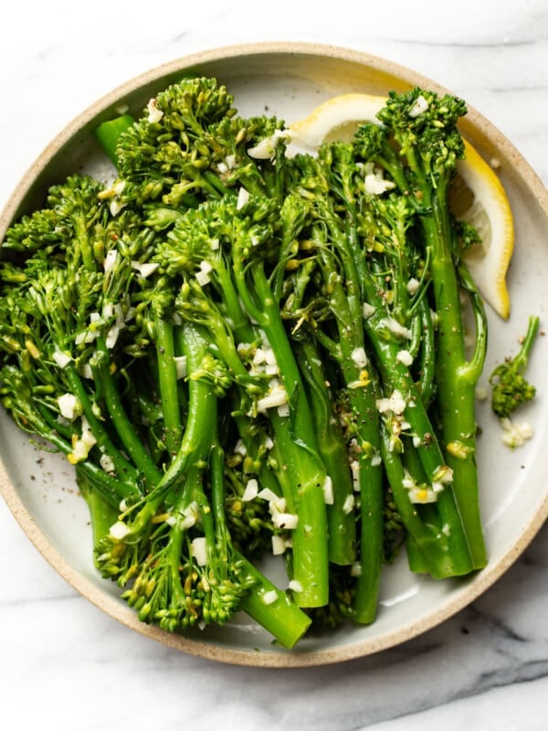 a plate with garlic butter broccolini