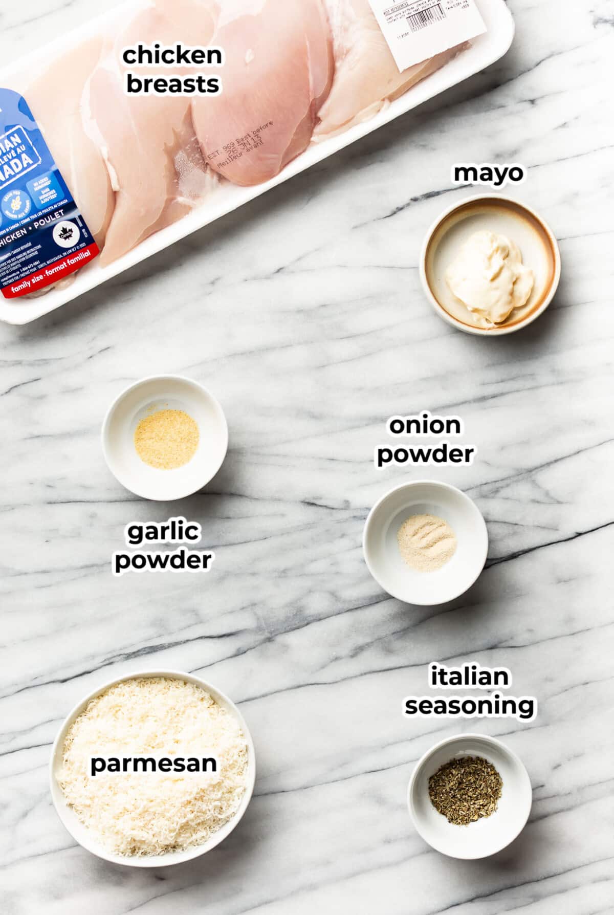 ingredients for baked parmesan chicken in prep bowls